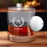 Whiskey rocks glass with a real Titleist golf ball embedded in the side.