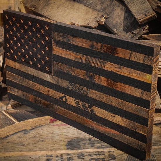 The American Flag is handmade from a used bourbon barrel