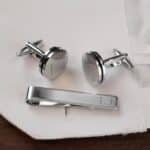 Engraved matching pin striped cuff links for the groom and groomsmen to wear on the wedding day