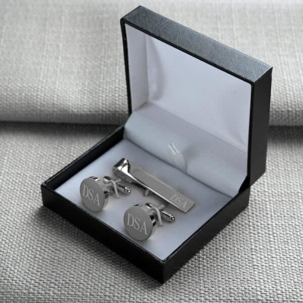 Silver round cufflinks and tie tack set shown in black gift box