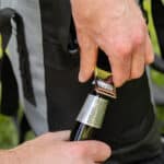 Featuring an attached bottle opener