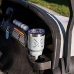 White golf tumbler in golf cart