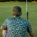 Green and yellow golf hat