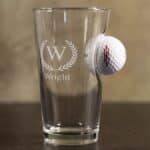 Custom golf beer glass with a golf ball "stuck" in the side