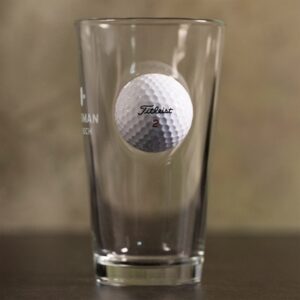 There's a real Titleist golf ball built into this custom beer glass from Benshot