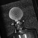 The custom golf ball shaped stopper lid fits on top of the decanter