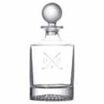 Golf decanter with golf ball stopper and dimpled bottom
