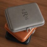 The custom men's travel tech organizer is available in grey, rawhide and black leather