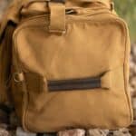 The side of the Long Weekend bag features a durable carrying handle for those extra rugged adventures
