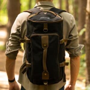 The charcoal grey Pathfinder bag shown being worn as a backpack.