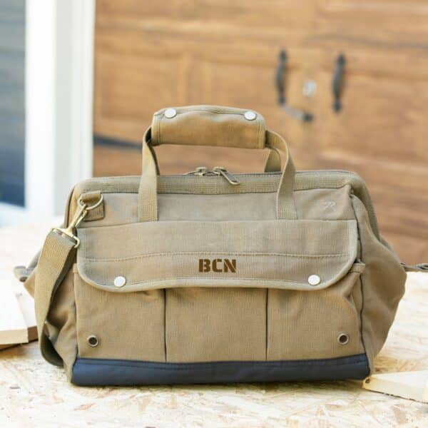 Green tool bag with custom brown thread