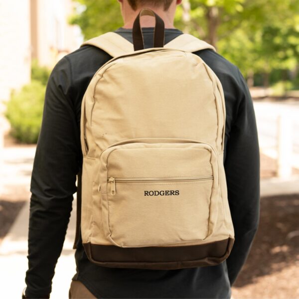 Man wearing personalized khaki backpack
