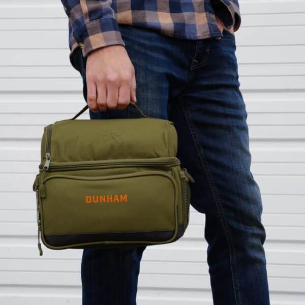 Custom green lunch cooler embroidered with a name in orange thread