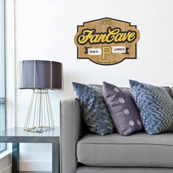 One of our MLB Fan Cave Signs shown hanging in a living room above a couch.