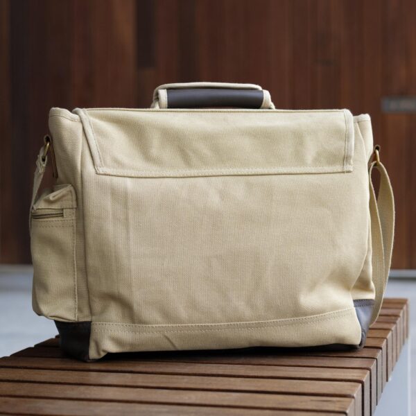 Back side of khaki messenger bag