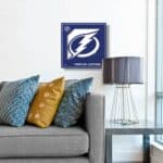 One of our NHL 3D Wall Art Signs shown hanging in a living room above a couch.