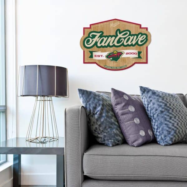NHL Fan Cave Sign shown hanging in a living room above a couch.