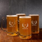 Groomsmen beer glasses with antler monogram design