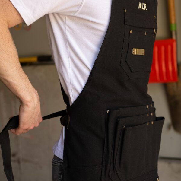Side-view of black apron
