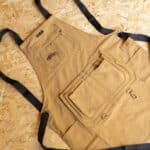 Brown work apron laying flat