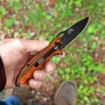Elk Ridge Trail Knife with blade open and being held