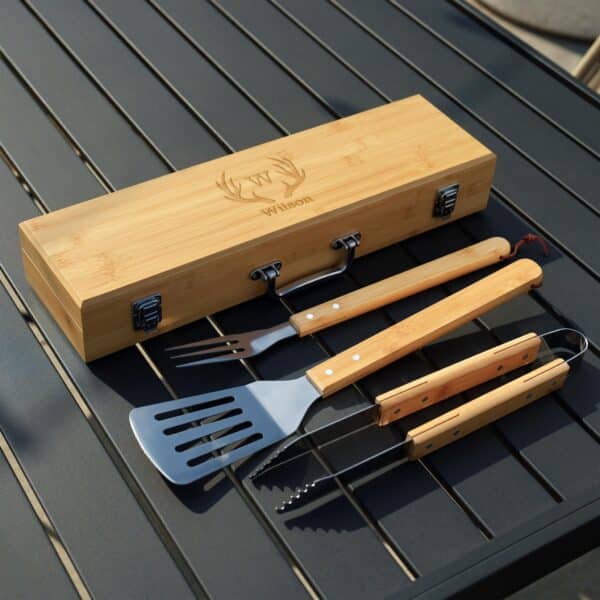 Personalized groomsmen BBQ grilling set with engraved bamboo case and stainless steel grill tools.