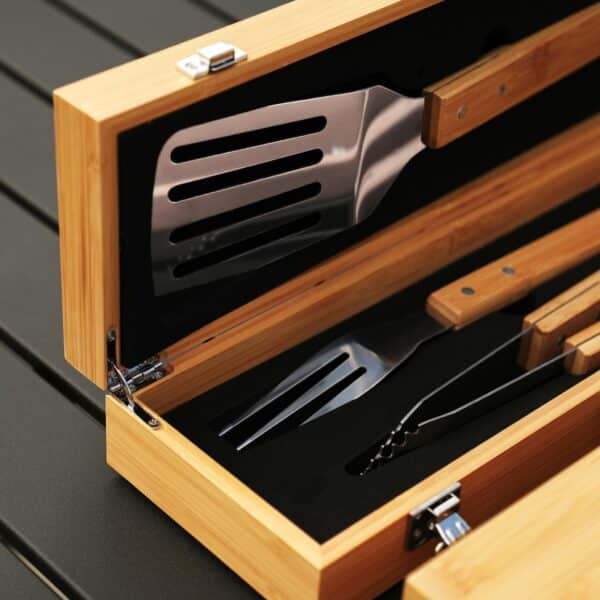 Custom engraved BBQ tool set for groomsmen featuring bamboo carrying case with spatula, fork, and tongs