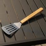 The grilling spatula features a genuine bamboo wood handle