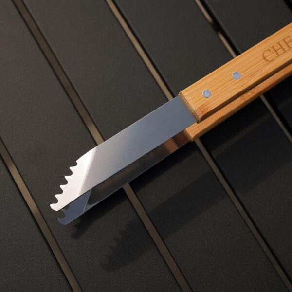 Close-up of the stainless steel BBQ tongs
