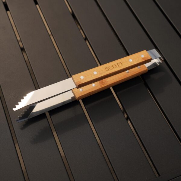 Close-up of grill tongs